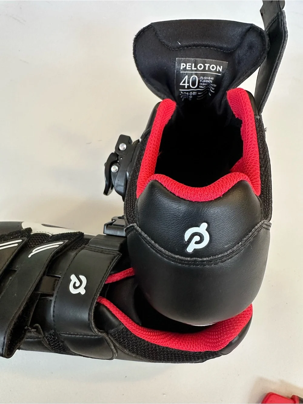 Peloton Black Cycling Shoes with Pink Lining and White Accents